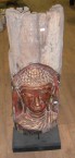 paneau en teak avec une tête de bouddha