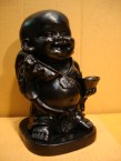enfant bouddha avec une coupe