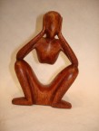 homme abstract assis les bras sur les genoux sans ventre