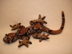 gecko avec du sable là dedans