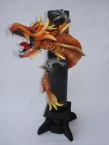 porte encens avec un dragon où la fumée sort de sa gueule