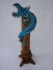 porte encens avec un dragon où la fumée sort de sa gueule