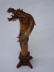 porte encens avec un dragon où la fumée sort de sa gueule