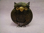hibou pour metre un bougie à l'interieur ou pour brulé un côn d'ensens