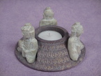 bougeoir rond avec bouddha