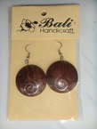 Des boucles d'oreille en bois dûr décorée avec l'argent afghan